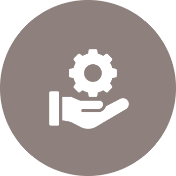 Hand holding gear icon on gray background.