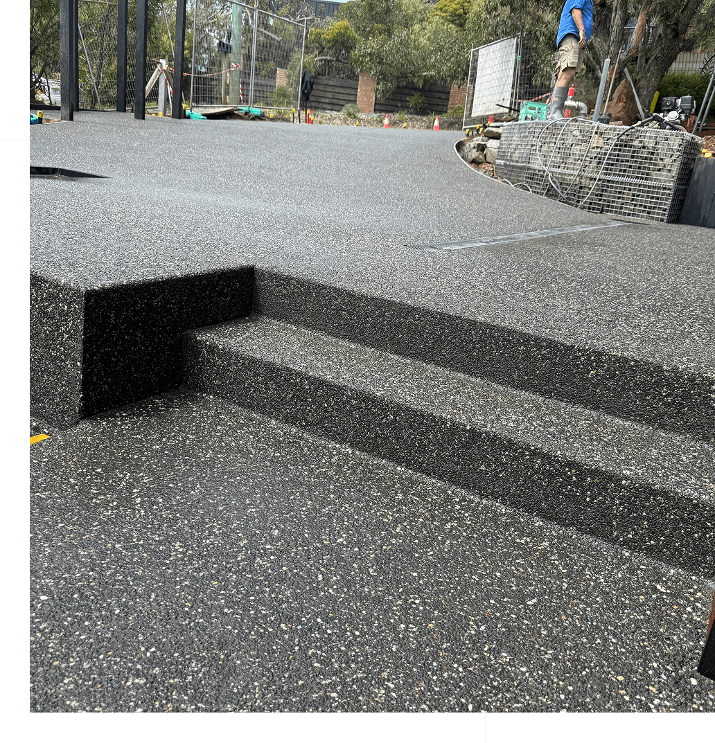 Concrete steps with textured surface outdoors.